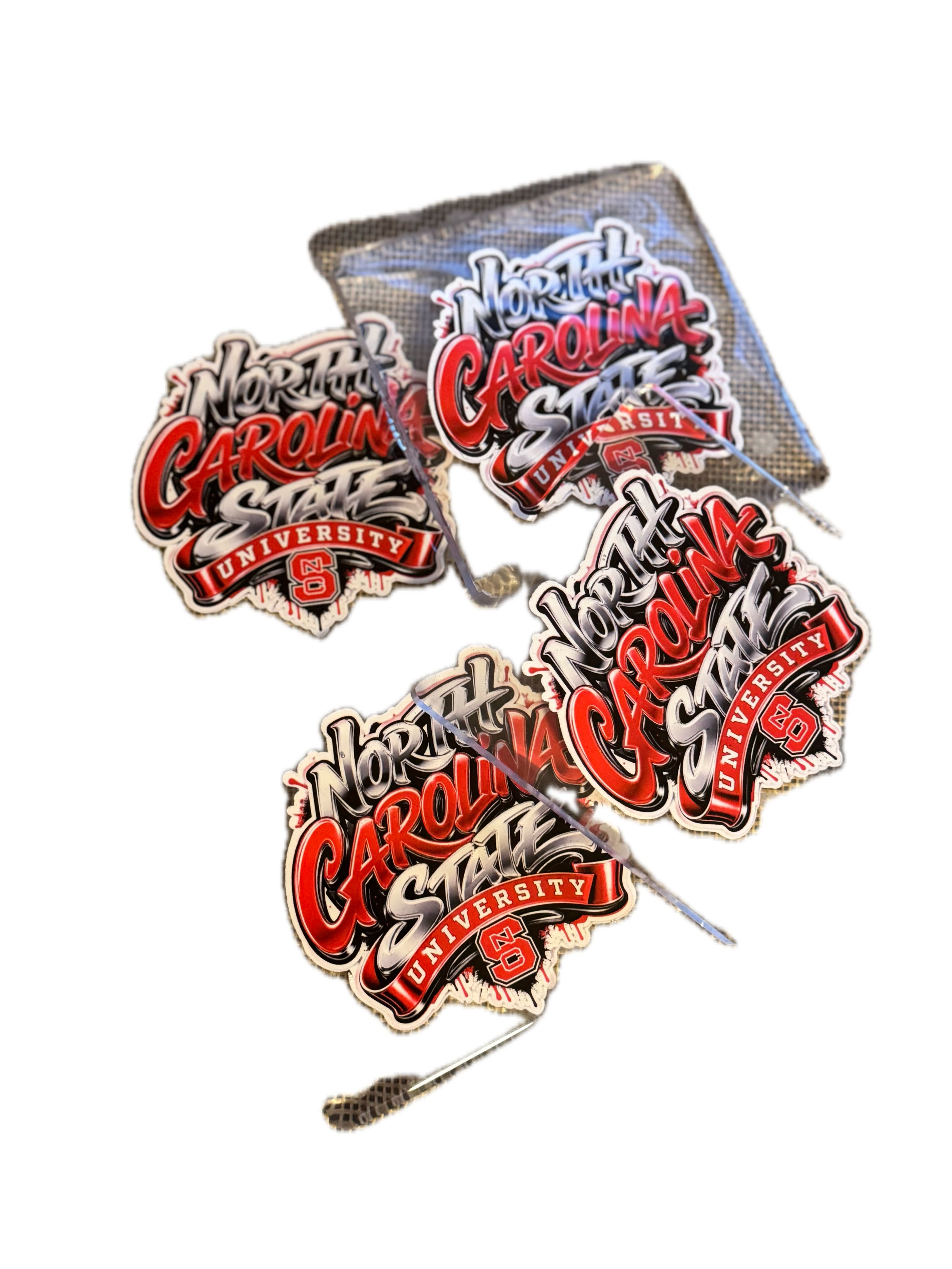 Clean product shots of custom hand-poured resin coasters including Carolina Panthers, Best Dad Ever, and NC college team designs on transparent backgrounds.